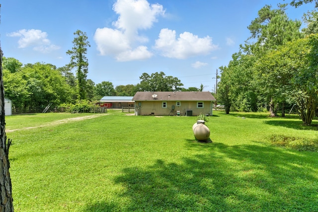 17715 Butera Rd, Magnolia, TX 77355 - back of property featuring a yard