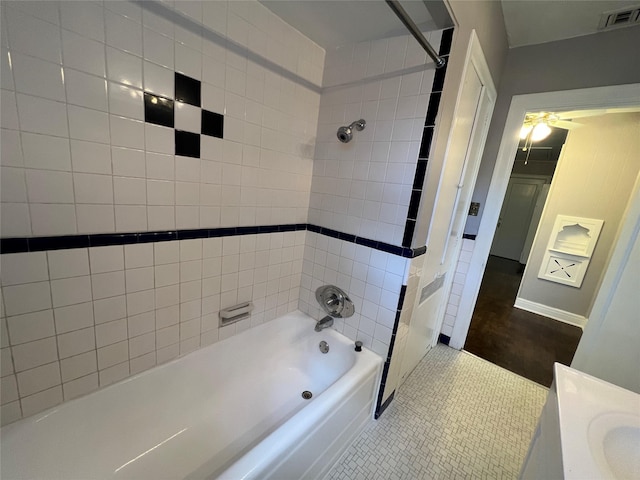 4905 Jackson St, Houston, TX 77004 - bathroom with vanity, shower / bathtub combination, and tile patterned flooring
