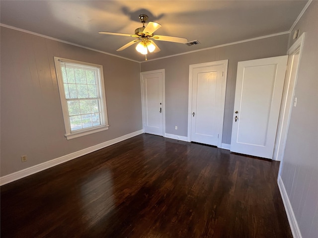 4905 Jackson St, Houston, TX 77004 - unfurnished bedroom with dark wood-style flooring, ornamental molding, and ceiling fan