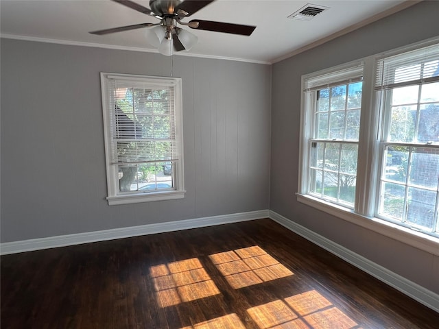 4905 Jackson St, Houston, TX 77004 - empty room with dark wood-type flooring, plenty of natural light, crown molding, and ceiling fan