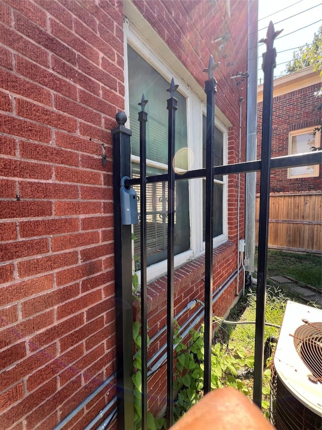 4905 Jackson St, Houston, TX 77004 - exterior view of a central air condition unit and brick siding