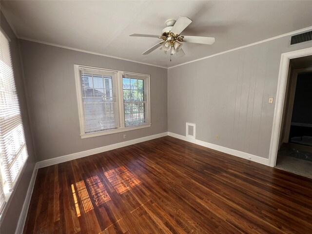 4905 Jackson St, Houston, TX 77004 - empty room with dark wood-style flooring, crown molding, and ceiling fan
