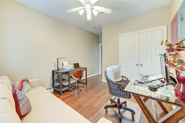 1415 Baldwin Square Ln, Houston, TX 77077 - home office with a ceiling fan and wood finished floors