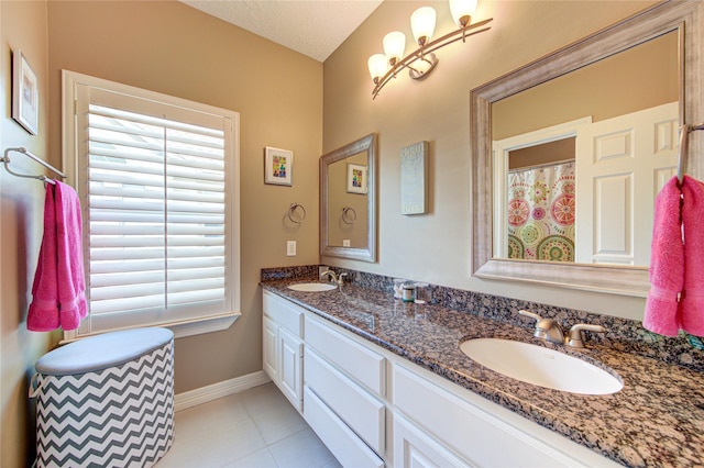 1415 Baldwin Square Ln, Houston, TX 77077 - full bathroom featuring double vanity and tile patterned floors