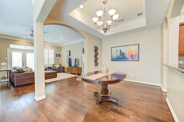 1415 Baldwin Square Ln, Houston, TX 77077 - dining space with arched walkways, a chandelier, dark wood-style flooring, crown molding, and recessed lighting