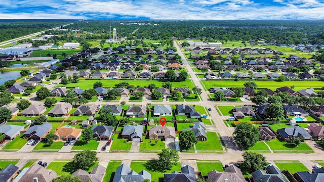 204 Audubon Woods Ct, Richwood, TX 77531 - aerial view of residential area featuring a nearby body of water