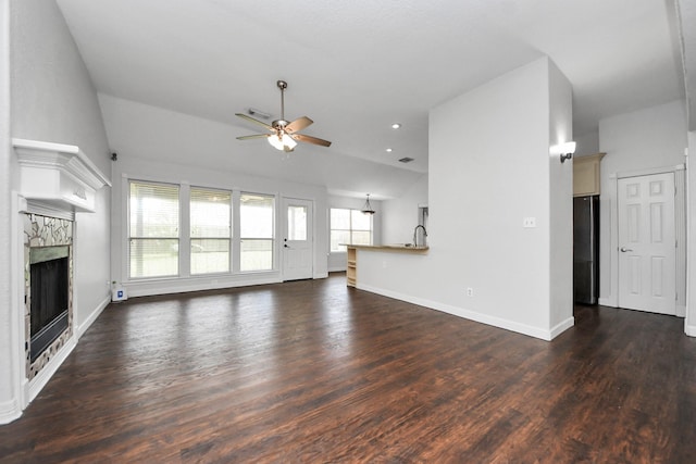 204 Audubon Woods Ct, Richwood, TX 77531 - unfurnished living room with ceiling fan, dark wood finished floors, a fireplace, and recessed lighting