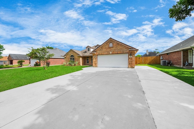 204 Audubon Woods Ct, Richwood, TX 77531 - traditional-style house featuring driveway, an attached garage, brick siding, and stone siding