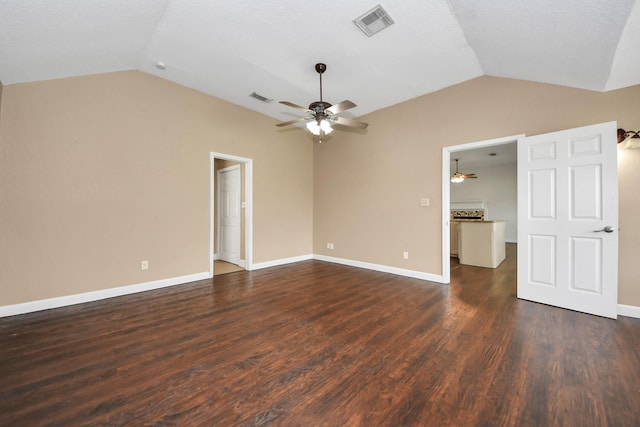 204 Audubon Woods Ct, Richwood, TX 77531 - empty room with vaulted ceiling, ceiling fan, and dark wood-type flooring