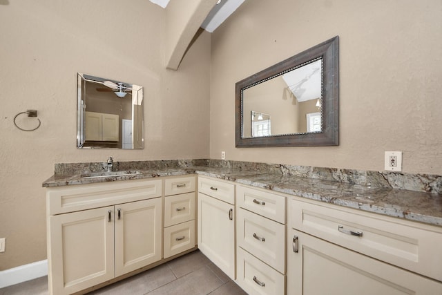 204 Audubon Woods Ct, Richwood, TX 77531 - full bathroom featuring double vanity, ceiling fan, and tile patterned floors