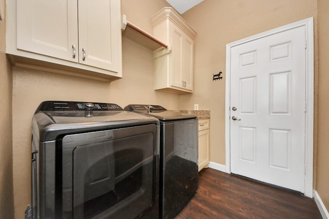 204 Audubon Woods Ct, Richwood, TX 77531 - laundry area with dark wood-style flooring, independent washer and dryer, and cabinet space