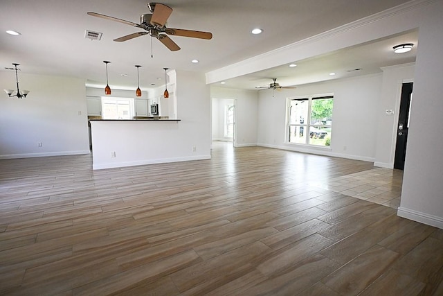 5035 Yarwell Dr, Houston, TX 77096 - unfurnished living room with ceiling fan, wood finished floors, and recessed lighting