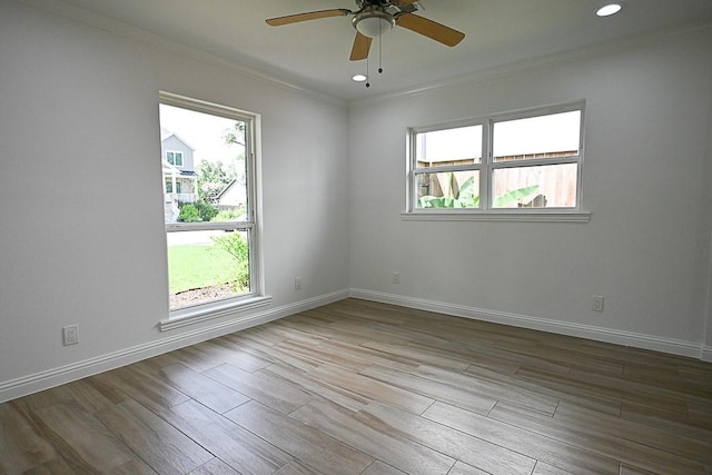 5035 Yarwell Dr, Houston, TX 77096 - spare room with crown molding, wood finished floors, a ceiling fan, and recessed lighting