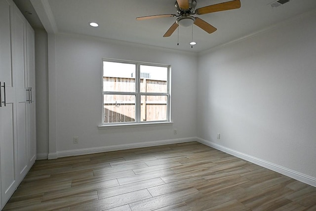 5035 Yarwell Dr, Houston, TX 77096 - empty room featuring wood finished floors, a ceiling fan, ornamental molding, and recessed lighting