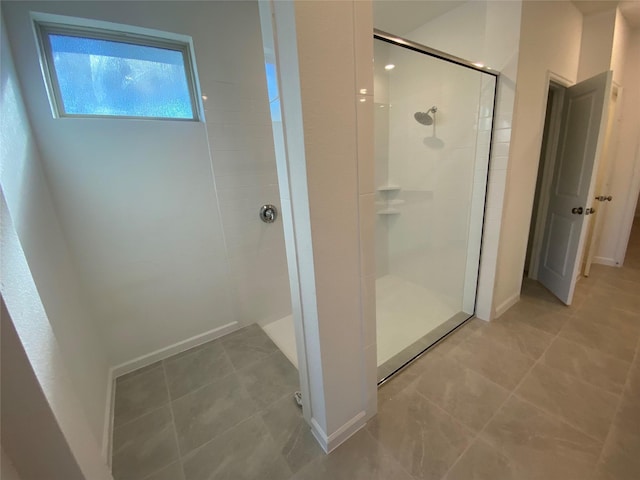 17910 Rillette Rd, Conroe, TX 77302 - full bathroom with tiled shower and tile patterned flooring