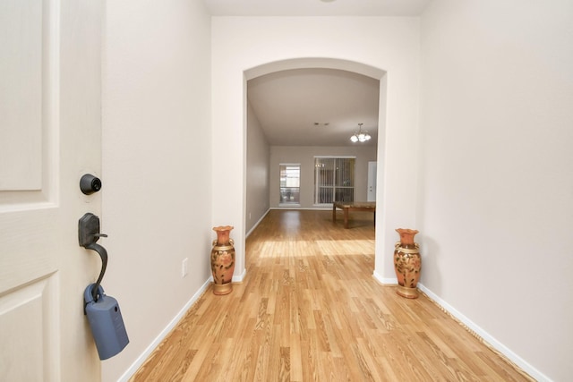 24219 Camillia Ridge Way, Katy, TX 77493 - entrance foyer with light wood finished floors and arched walkways