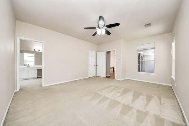 24219 Camillia Ridge Way, Katy, TX 77493 - unfurnished bedroom featuring light colored carpet and ensuite bath