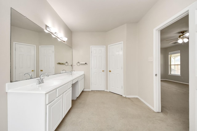 24219 Camillia Ridge Way, Katy, TX 77493 - full bath with double vanity, a ceiling fan, and carpet flooring