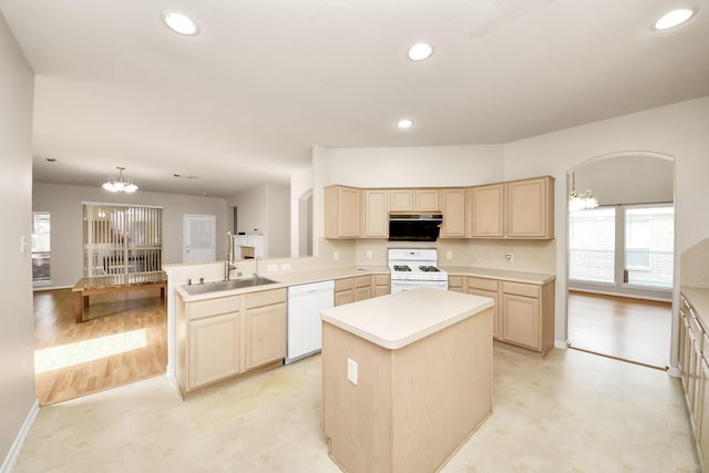 24219 Camillia Ridge Way, Katy, TX 77493 - kitchen featuring white appliances, light brown cabinetry, a chandelier, light countertops, and a center island
