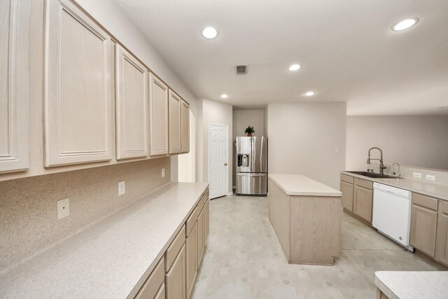 24219 Camillia Ridge Way, Katy, TX 77493 - kitchen with stainless steel refrigerator with ice dispenser, white dishwasher, a center island, recessed lighting, and light countertops