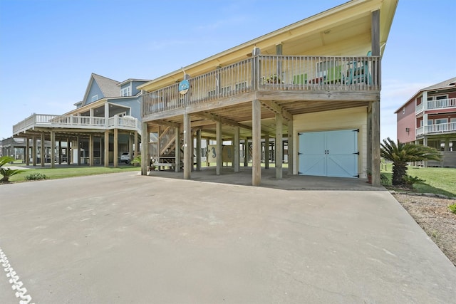 2577 Holiday Dr, Crystal Beach, TX 77650 - view of property with a carport and driveway