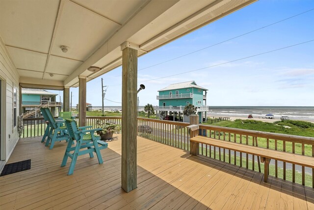 2577 Holiday Dr, Crystal Beach, TX 77650 - wooden deck featuring a water view
