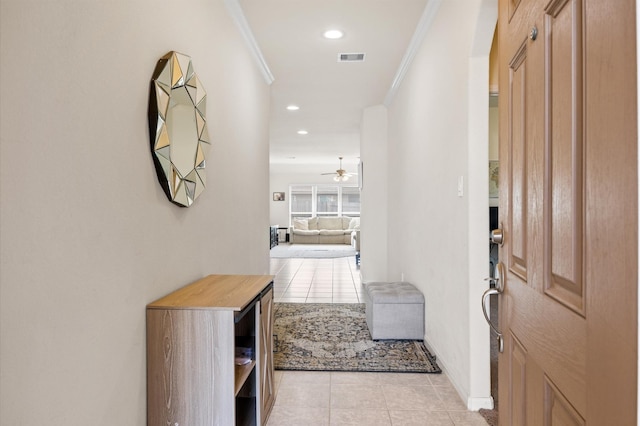 9127 Sasson Blvd, Houston, TX 77044 - entrance foyer with ornamental molding, light tile patterned flooring, recessed lighting, and ceiling fan