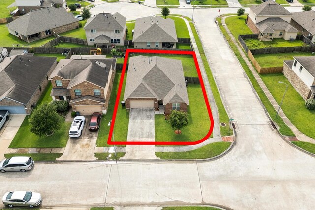 9127 Sasson Blvd, Houston, TX 77044 - aerial perspective of suburban area featuring property parcel outlined