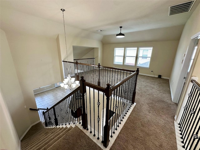 22411 Limestone Crest Ln, Katy, TX 77449 - stairs with a chandelier, carpet flooring, and vaulted ceiling