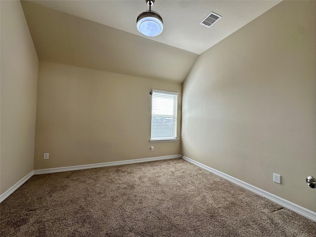 22411 Limestone Crest Ln, Katy, TX 77449 - unfurnished room featuring lofted ceiling and carpet flooring