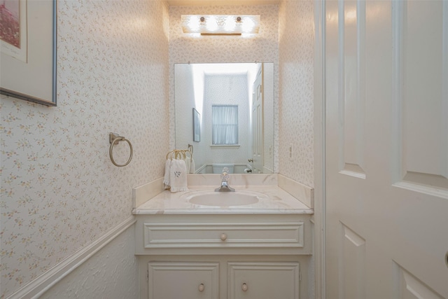 17718 Terrawren Ln, Spring, TX 77379 - bathroom with wallpapered walls and vanity