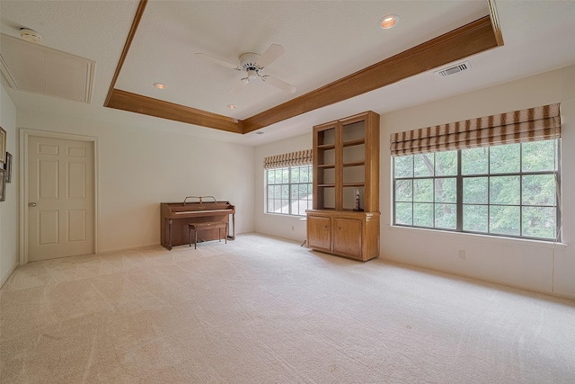 17718 Terrawren Ln, Spring, TX 77379 - empty room with attic access, ceiling fan, light carpet, a tray ceiling, and a smoke detector