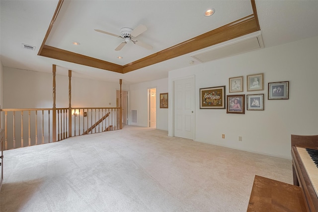 17718 Terrawren Ln, Spring, TX 77379 - unfurnished room with attic access, light carpet, ceiling fan, a raised ceiling, and recessed lighting