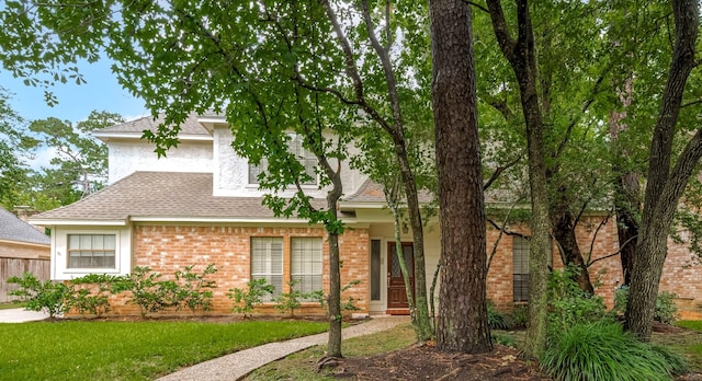17718 Terrawren Ln, Spring, TX 77379 - view of front of house with a shingled roof and brick siding