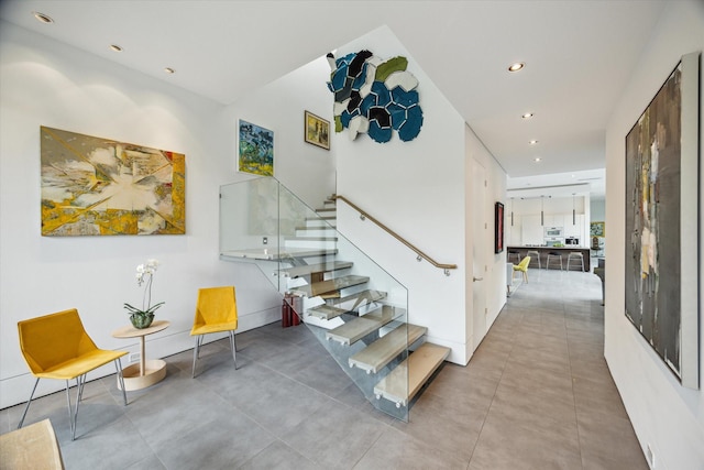 2332 Wroxton Rd, Houston, TX 77005 - stairs with recessed lighting and concrete floors