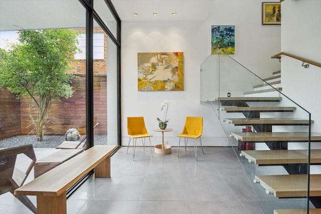 2332 Wroxton Rd, Houston, TX 77005 - stairway featuring expansive windows