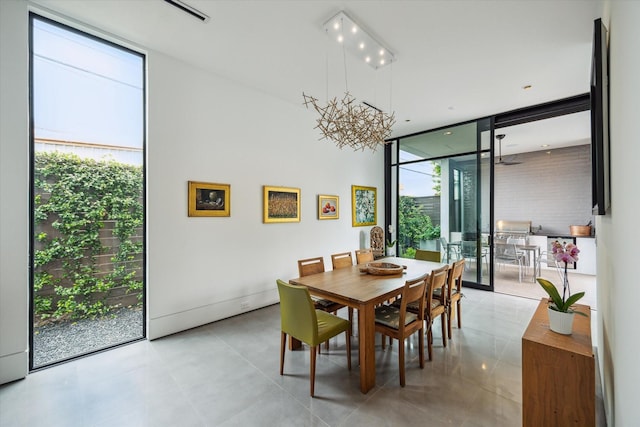 2332 Wroxton Rd, Houston, TX 77005 - dining area with expansive windows