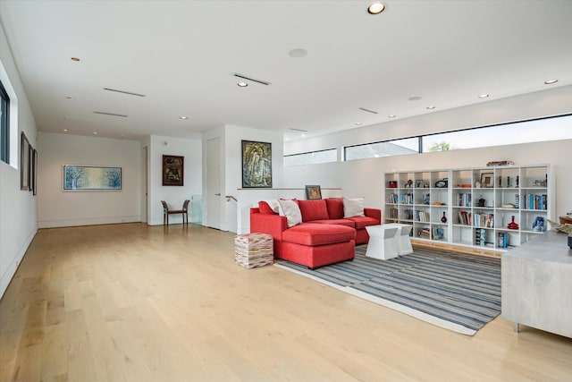 2332 Wroxton Rd, Houston, TX 77005 - living room with wood finished floors and recessed lighting