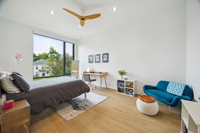 2332 Wroxton Rd, Houston, TX 77005 - bedroom with recessed lighting, wood finished floors, and ceiling fan