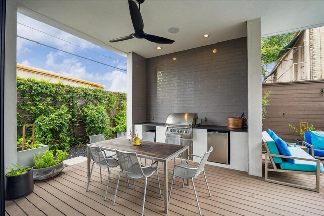 2332 Wroxton Rd, Houston, TX 77005 - deck featuring exterior kitchen, a ceiling fan, and outdoor dining space