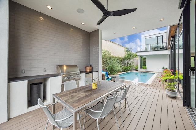 2332 Wroxton Rd, Houston, TX 77005 - deck with area for grilling, outdoor dining space, an outdoor pool, and a ceiling fan