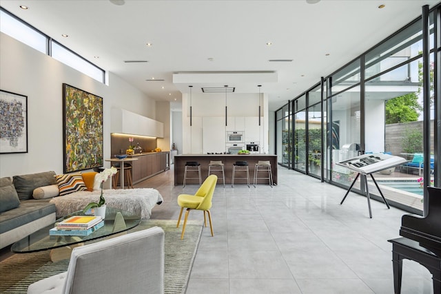 2332 Wroxton Rd, Houston, TX 77005 - living area with a wall of windows