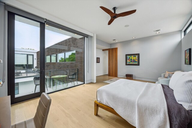 2332 Wroxton Rd, Houston, TX 77005 - bedroom with access to exterior, light wood-style floors, recessed lighting, and ceiling fan