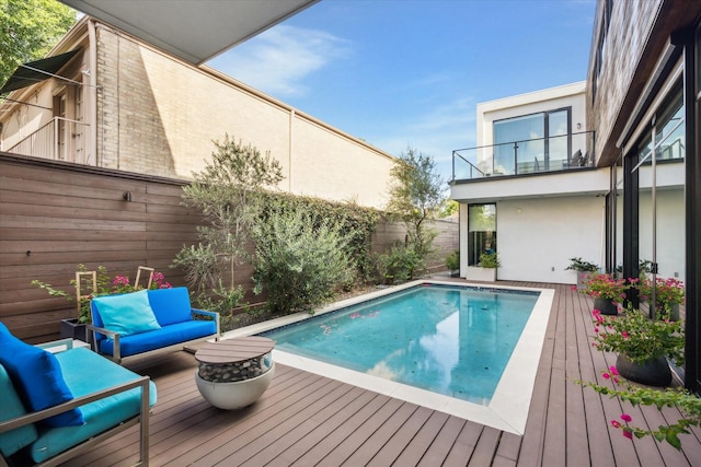 2332 Wroxton Rd, Houston, TX 77005 - view of pool featuring outdoor lounge area, a wooden deck, and a fenced backyard
