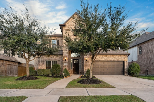 2131 Acadian Way, Brookshire, TX 77423 - view of front of property featuring brick siding, concrete driveway, and a garage