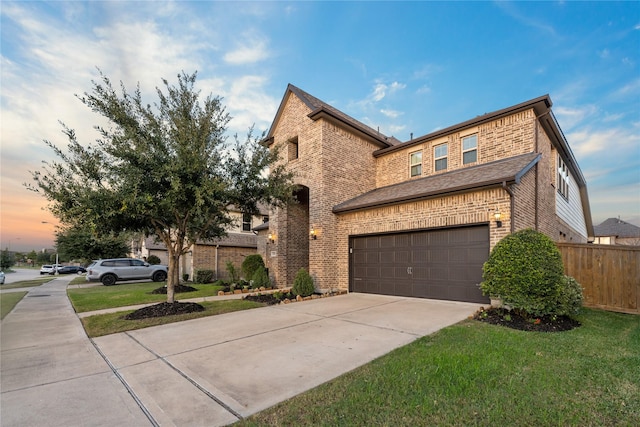 2131 Acadian Way, Brookshire, TX 77423 - view of front of property with brick siding, a garage, and concrete driveway