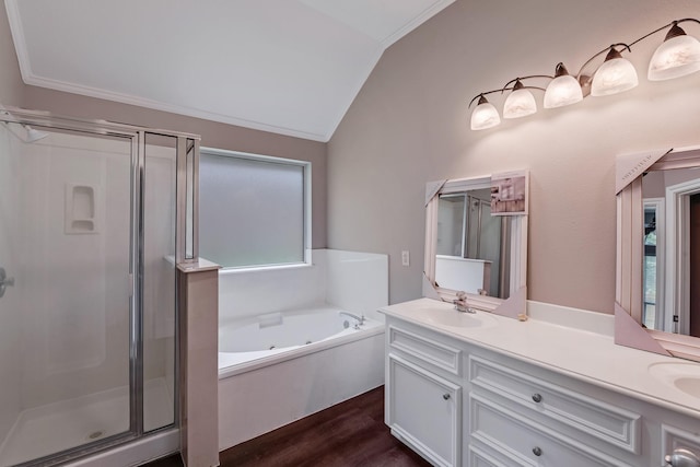 461 Cumberland Trl, Conroe, TX 77302 - full bathroom featuring lofted ceiling, a stall shower, double vanity, a whirlpool tub, and wood finished floors