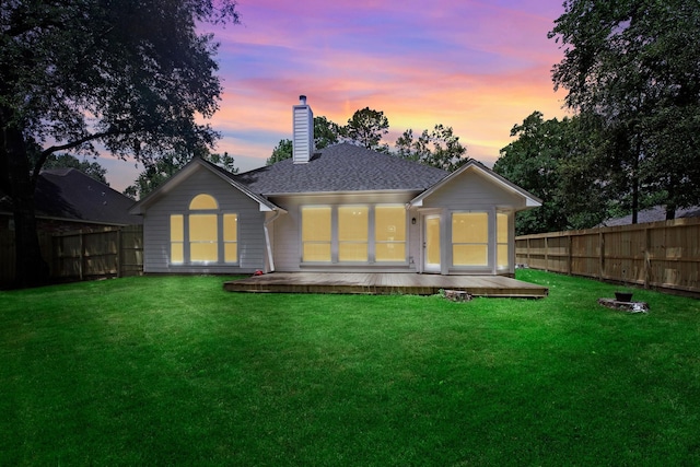 461 Cumberland Trl, Conroe, TX 77302 - rear view of property with a fenced backyard, a wooden deck, and a chimney