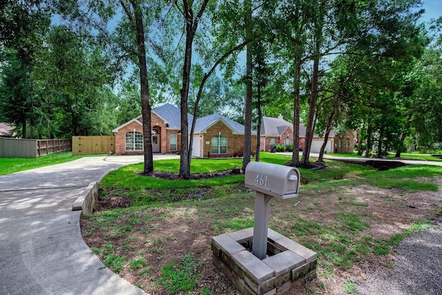 461 Cumberland Trl, Conroe, TX 77302 - view of front of house with concrete driveway