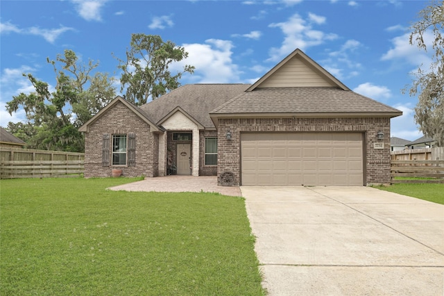 2234 Shalmar Dr, West Columbia, TX 77486 - view of front of property featuring brick siding, an attached garage, a shingled roof, and concrete driveway